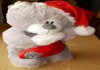 Фото Санта Клаус в колпачке с носочком, мишка, мягкая игрушка